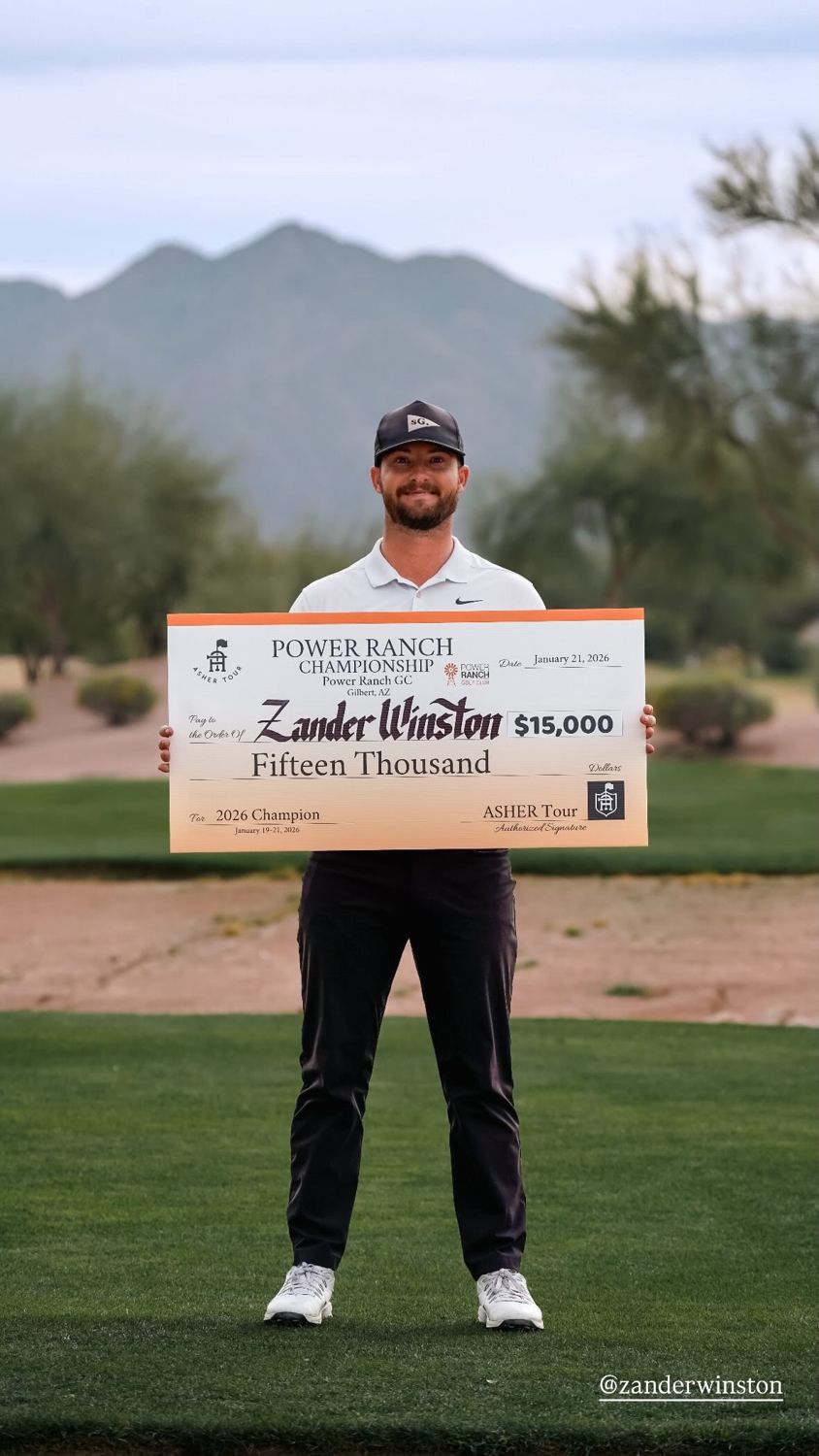 Zander holding the $15,000 Power Ranch Championship check